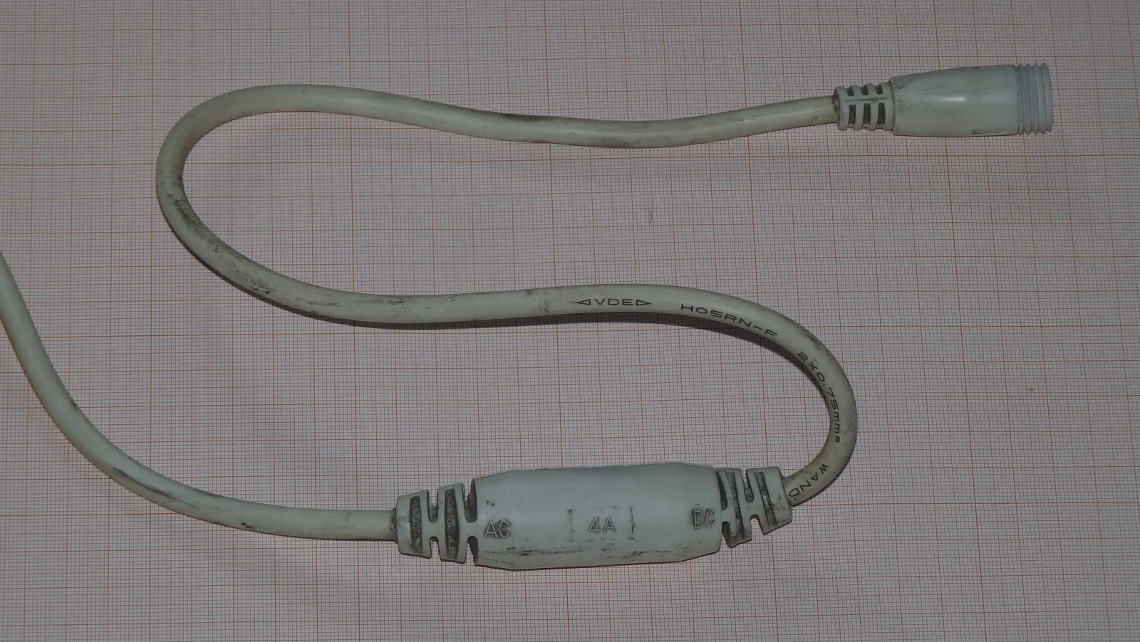 Public reference photograph of an LED power supply on a cable