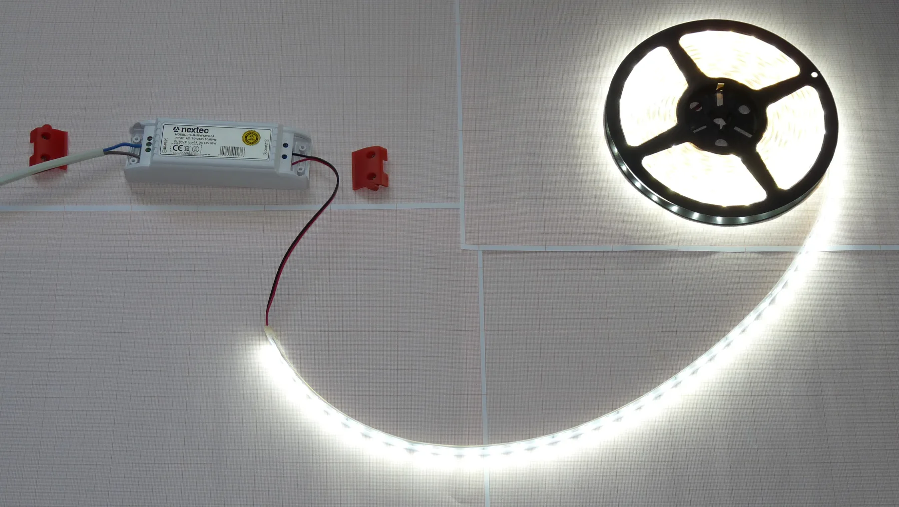 Public reference photograph showing an LED strip connected to a power supply