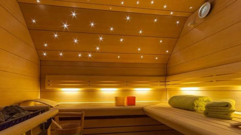 Reference starry ceiling fiber optic lighting in a sauna